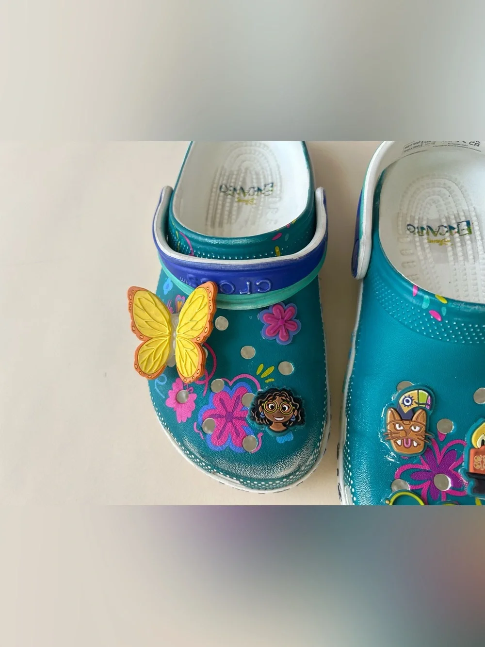 Disney / crocs Teal Kids Clog Sandals with Fun Decorative Charms Encanto